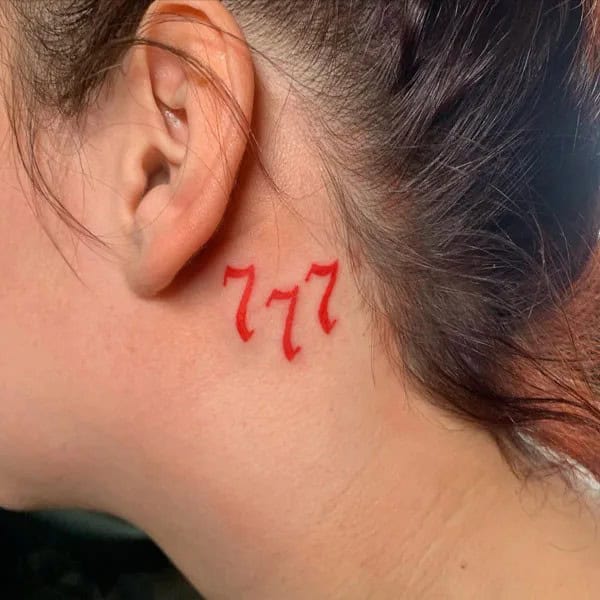 Behind the ear 777 Tattoo