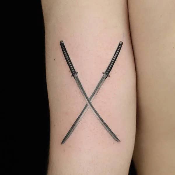 Crossing Swords Tattoo