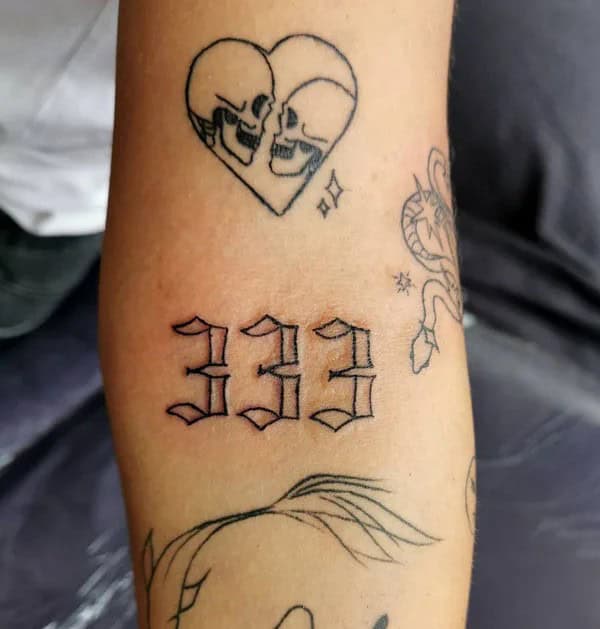 A Deep Dive on the Multiple Meanings of 333 Tattoos