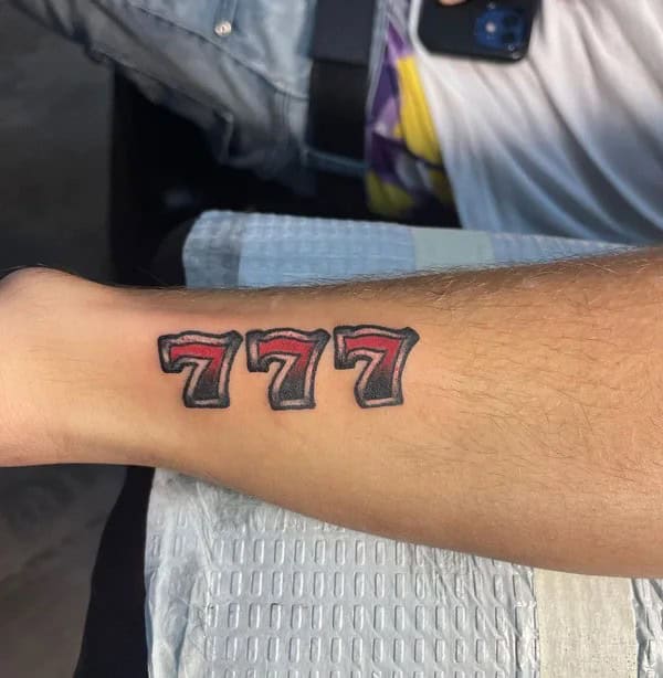 Behind the ear 777 Tattoo