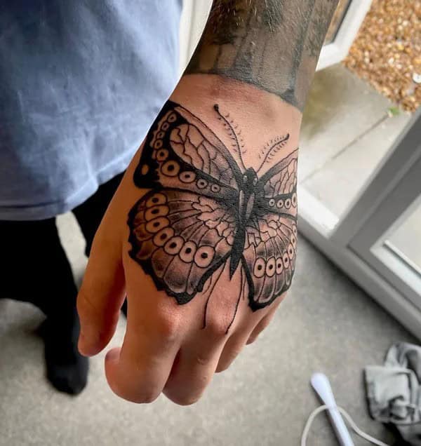 Semicolon Butterfly Hand Tattoo