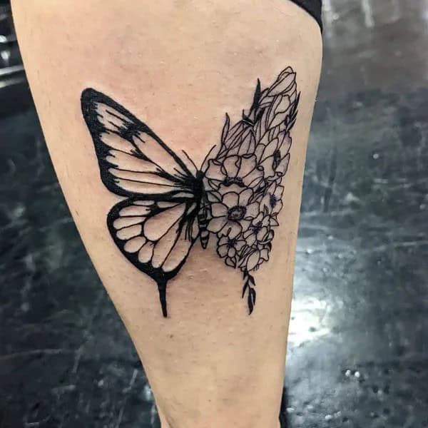 Half butterfly half flower forearm tattoo