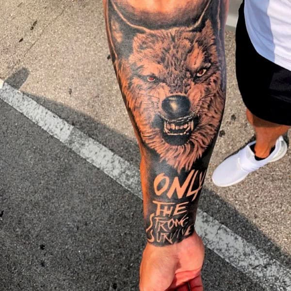 “Only The Strong Survive” Wolf Tattoo