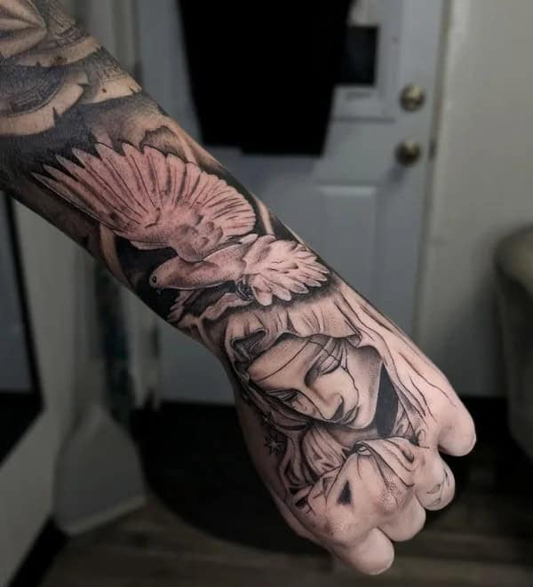 Virgin Mary Hand Tattoo