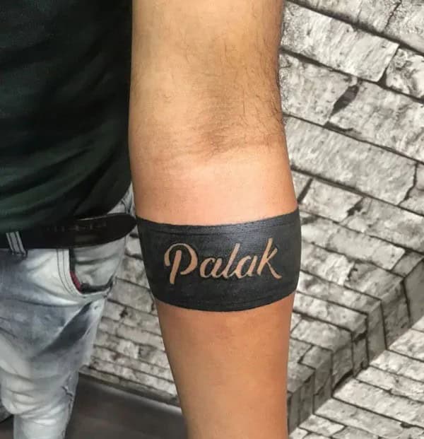 Forearm Name Tattoo