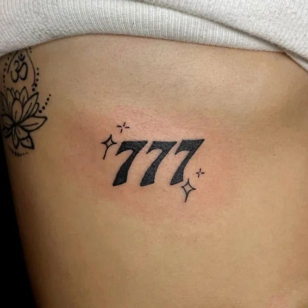 Behind the ear 777 Tattoo