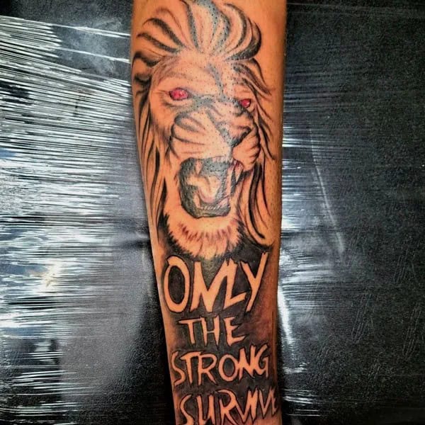 “Only The Strong Survive” Lion Tattoo