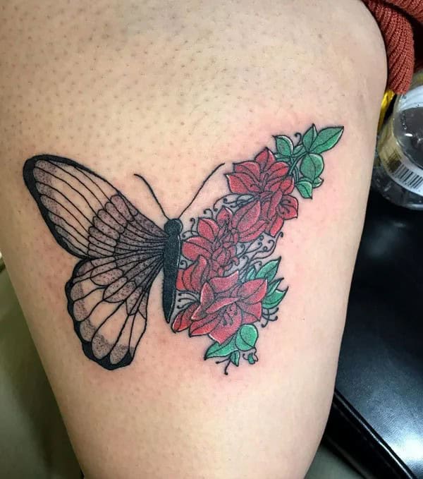 Half butterfly half flower forearm tattoo