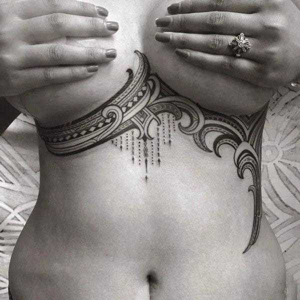 Tribal Tattoo Under Breast