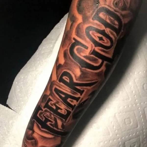 Fear God Tattoo on Forearm