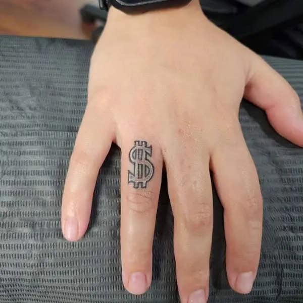 Dollar Sign Finger Tattoo