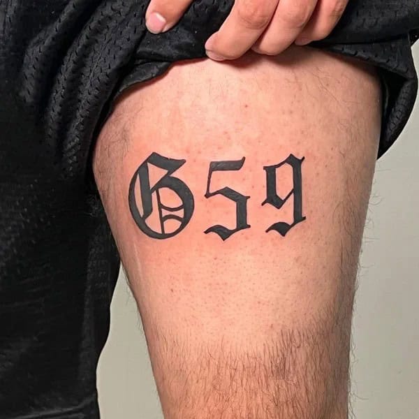 G59 Thigh Tattoo