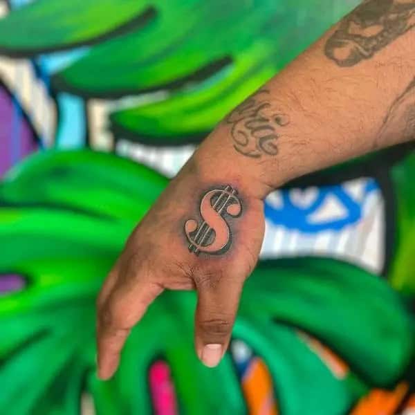 Dollar Sign Hand Tattoo