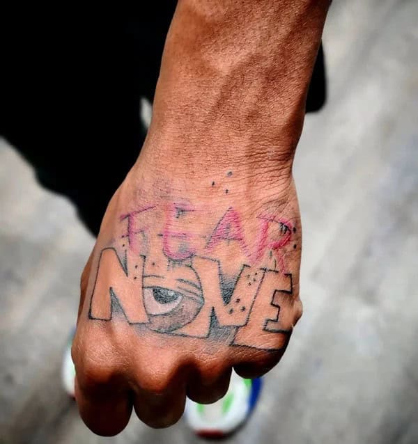 Fear None Hand Tattoo