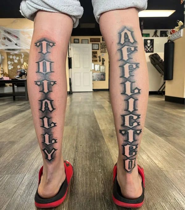 Negative Space Lettering Tattoo