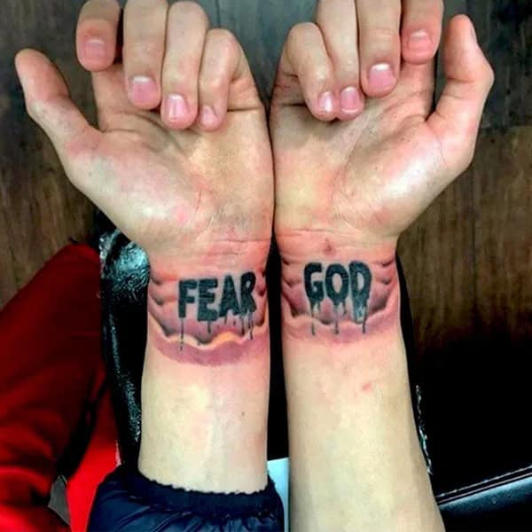 Fear God Tattoo on Wrist