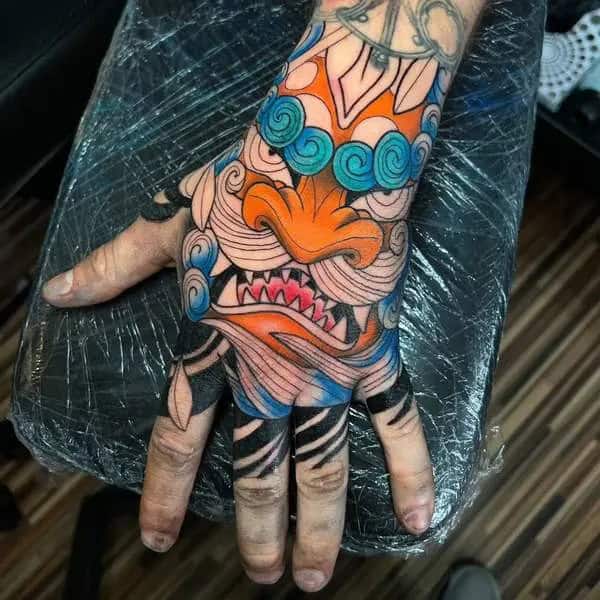 Foo Dog Hand Tattoo