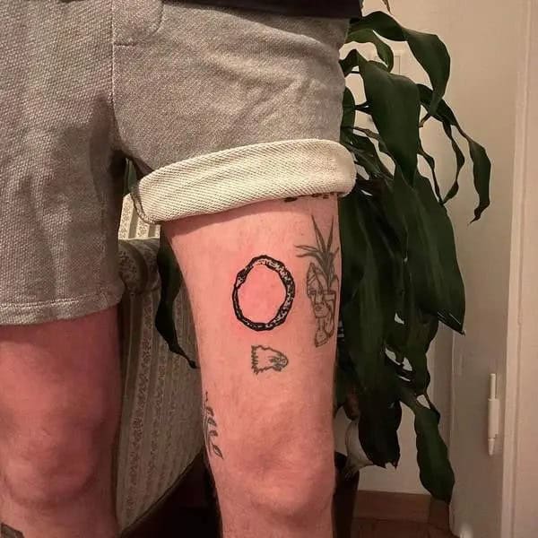 Minimalist Ouroboros Tattoo