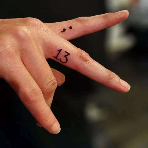 Semicolon Tattoo on Finger