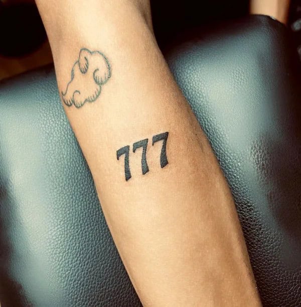 Behind the ear 777 Tattoo