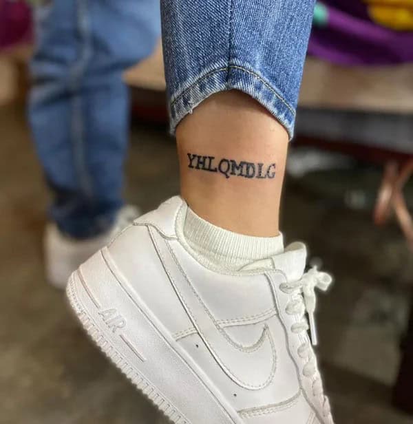 “YHLQMDLG”  Ankle Tattoo