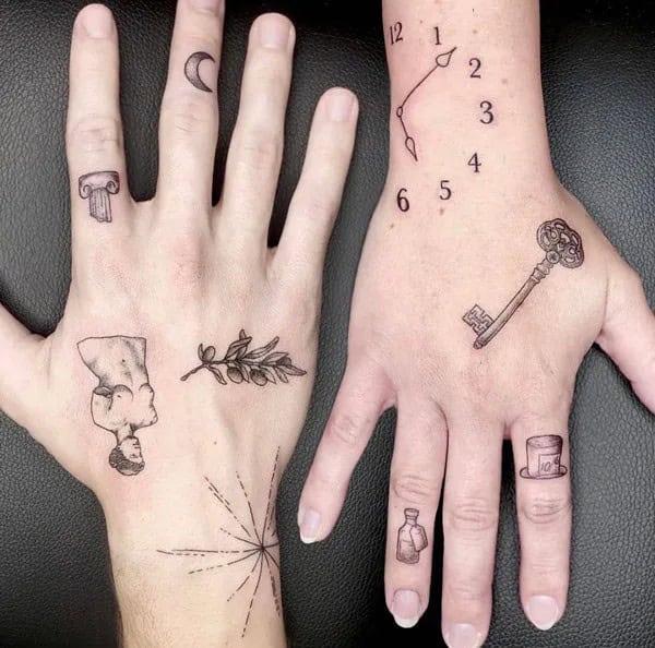 Patchwork Hand Tattoo