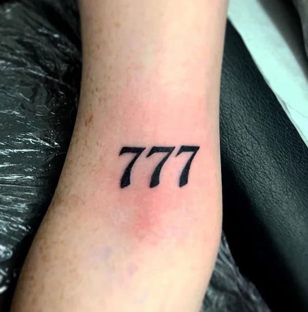 Behind the ear 777 Tattoo