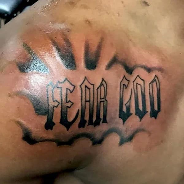 Fear God Tattoo on Shoulder