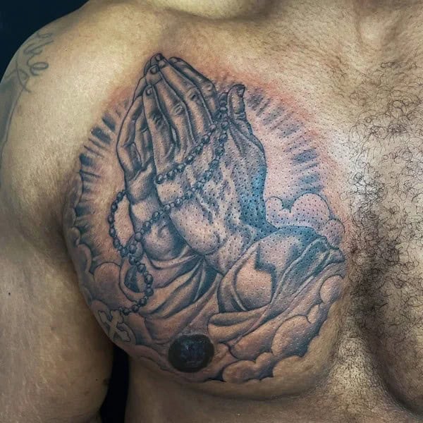 Praying Hands Chest Tattoo