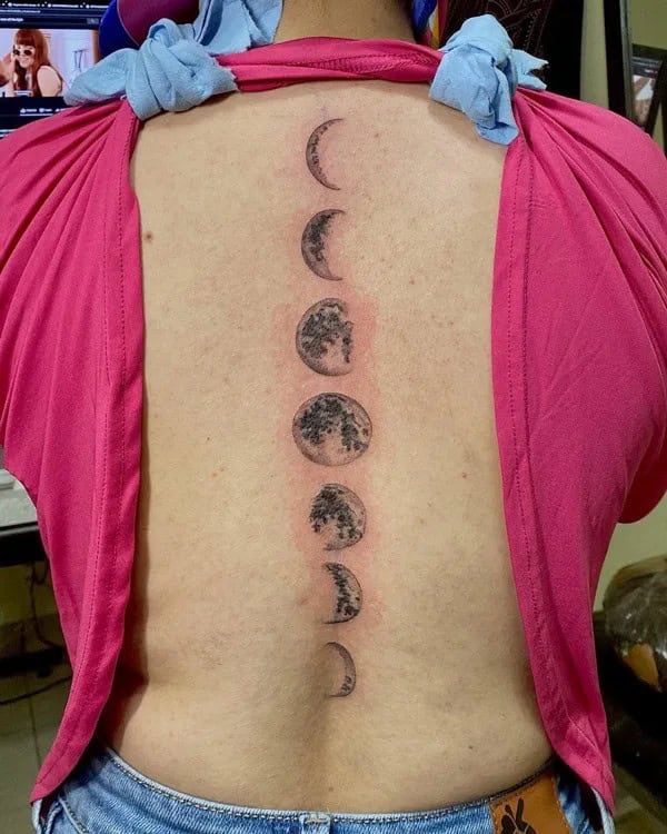 Moon Phase Tattoo on Spine