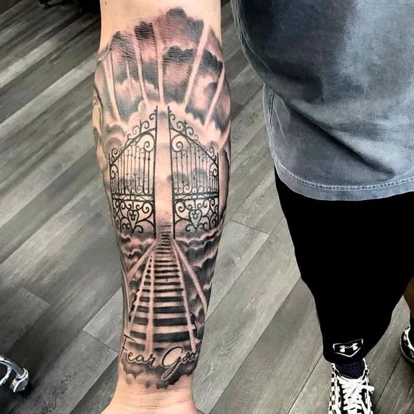 Fear God Tattoo on Forearm