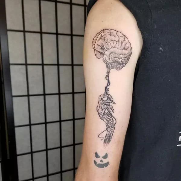 Skeleton Hand Tattoo On Arm