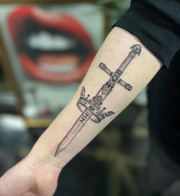 Unveiling The Heavy Meaning Of Sword Tattoos