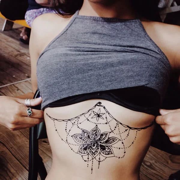 Lotus Sternum Tattoo