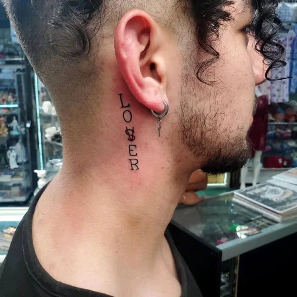 Behind the ear tattoo