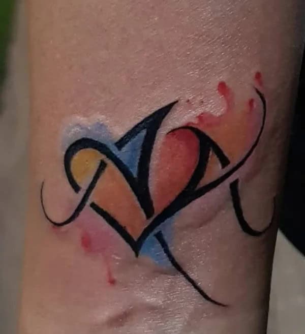 Watercolor Initial Tattoo