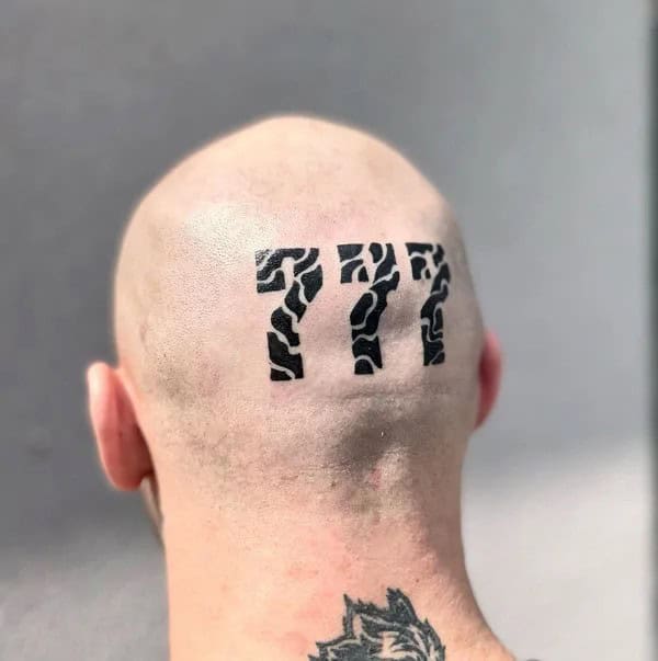 Behind the ear 777 Tattoo