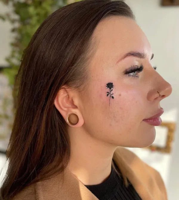 Black Rose Tattoo on the Face