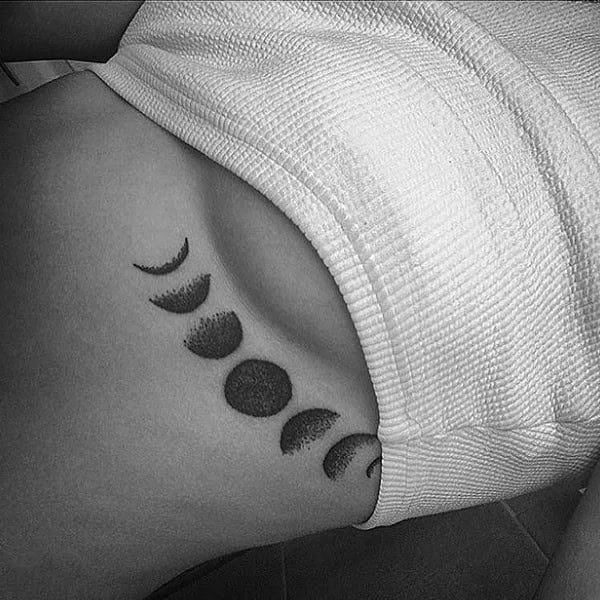 Moon Phases Tattoo Under Breast