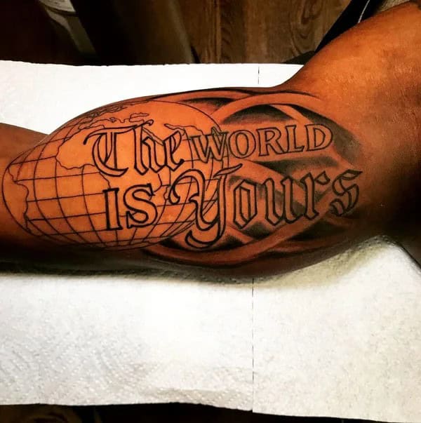 “The World Is Yours” Bicep Tattoo