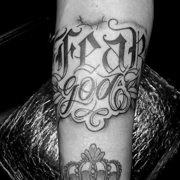 Fear God Tattoo on Forearm