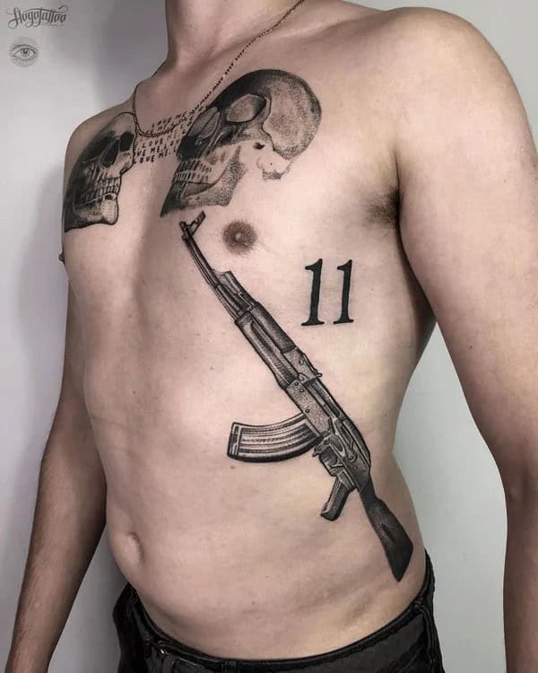 AK-47 Rib Tattoo