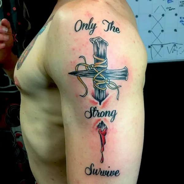 “Only The Strong Survive” Tattoo with a Cross