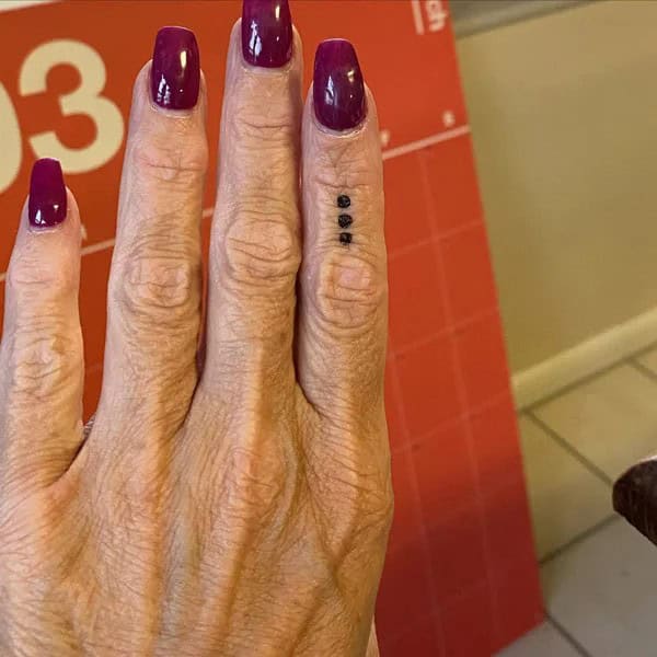 Three Dots Finger Tattoo