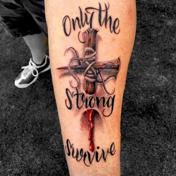 “Only The Strong Survive” Tattoo with a Cross