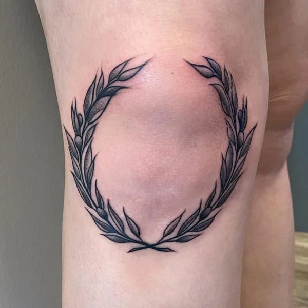 Olive branch knee tattoo