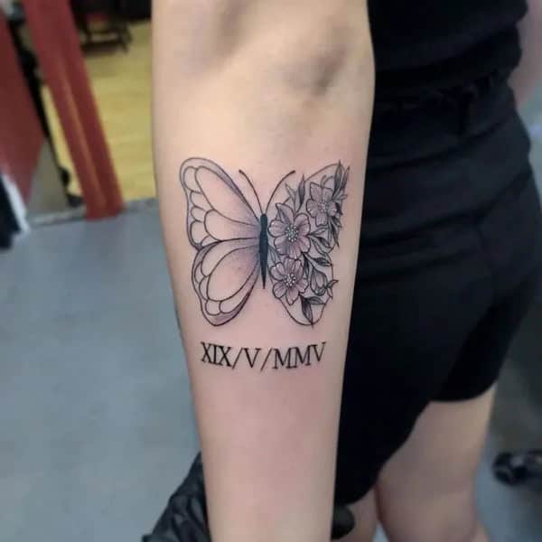 Half butterfly half flower forearm tattoo