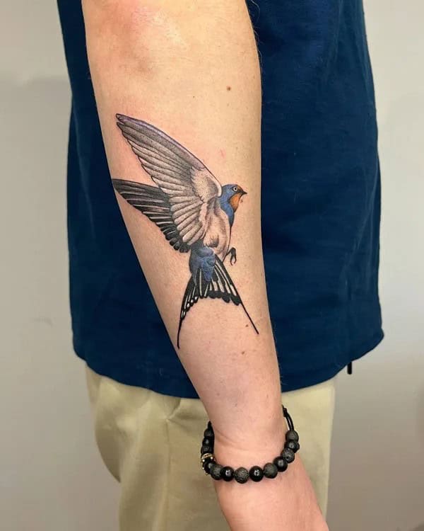 Forearm Bird Tattoo