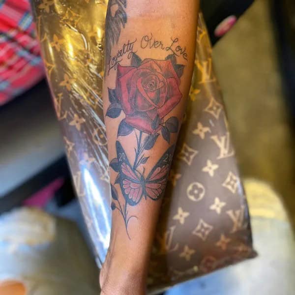 Floral Loyalty Over Love Tattoo