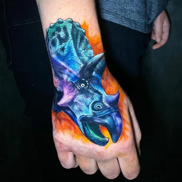 Dinosaur Hand Tattoo